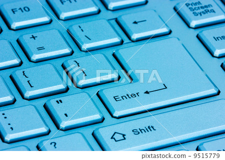 Modern computer keyboard in a blue light 9515779