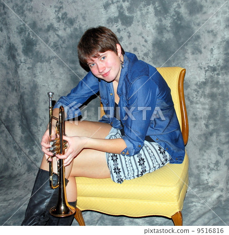 Female trumpet player. Female trumpet player. 9516816