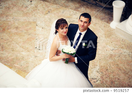 Newlyweds embraces Newlyweds embraces 9519257