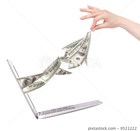 Laptop making money concept isolated Laptop making money concept isolated 9521222