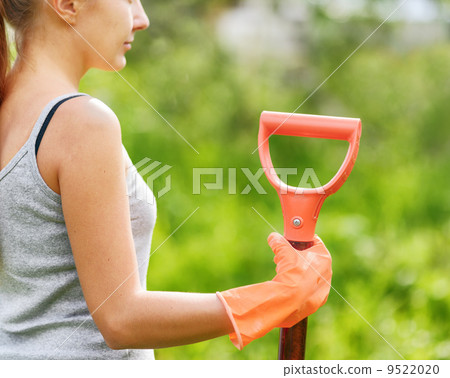 Woman working in the garden 9522020