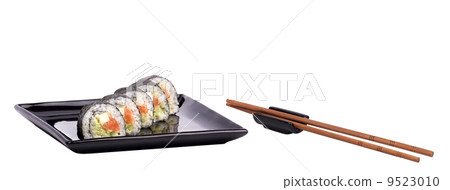 Sushi - Roll with chopsticks isolated Sushi - Roll with chopsticks isolated 9523010