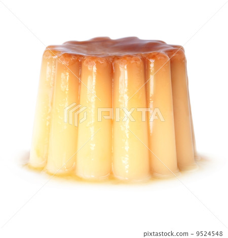 A delicious pudding with caramel on a white background. 9524548