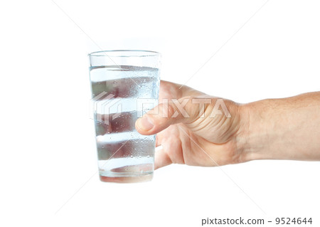 A glass of pure water in hand. A glass of pure water in hand. 9524644