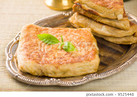 mutabbaq a popular arab ramadan food where bread if stuffed with 9525448