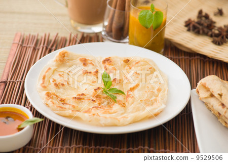 roti canai flat bread, very famous mamak food in malaysia, usual roti canai flat bread, very famous mamak food in malaysia, usual 9529506