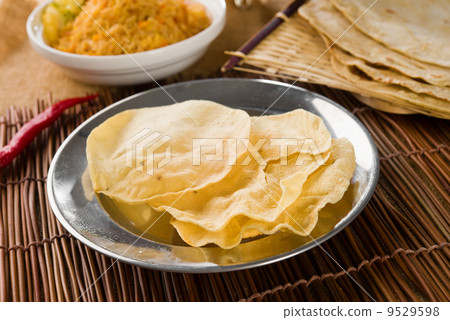 Papadum or papad with various traditional india foods Papadum or papad with various traditional india foods 9529598