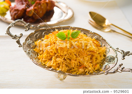 Chicken Biryani rice in silver plate Chicken Biryani rice in silver plate 9529601