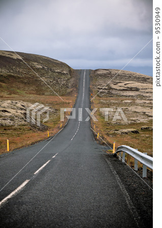 Highway through Iceland landscape at overcast day Highway through Iceland landscape at overcast day 9530949