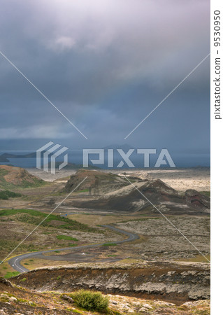 Highway through Iceland landscape at overcast day Highway through Iceland landscape at overcast day 9530950