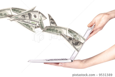 Laptop making money concept isolated Laptop making money concept isolated 9531389