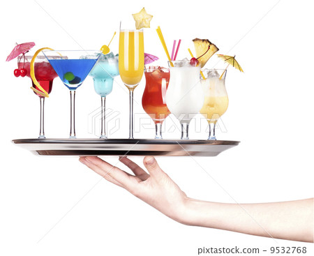 hand with alcohol cocktail on a silver tray 9532768