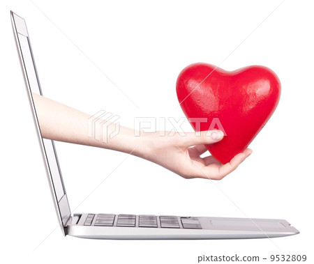 hand with a heart - gift and laptop 9532809