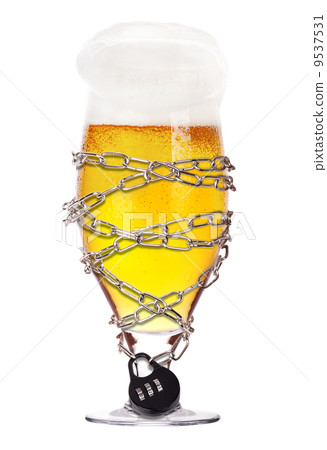 alcoholism concept - beer locked on a chain 9537531