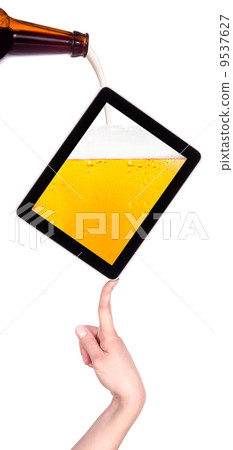 digital tablet with beer concept 9537627