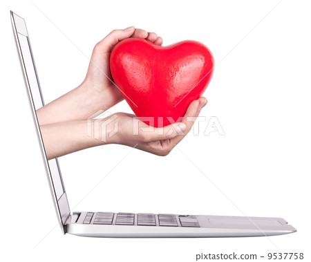 hand with a heart - gift and laptop 9537758