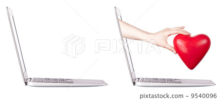hand with a heart - gift and laptop hand with a heart - gift and laptop 9540096