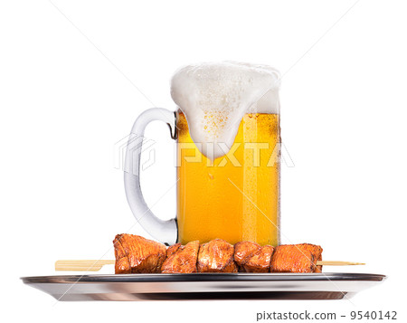 fresh grilled meat dishes with beer 9540142