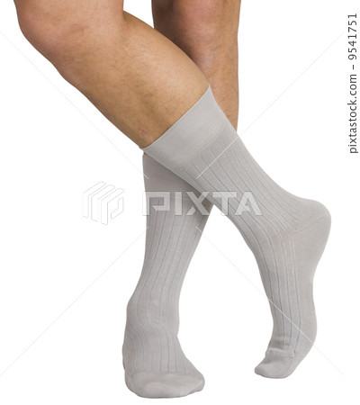 Male legs in socks. Isolated on white background Male legs in socks. Isolated on white background 9541751