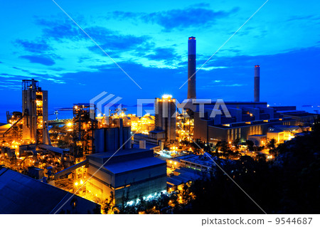 Gas storage spheres tank in petrochemical plant in sunset 9544687