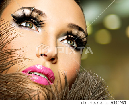 Beautiful woman with bright professional make-up 9544985