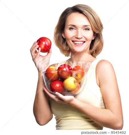 Portrait of a young woman with apples. Portrait of a young woman with apples. 9545402