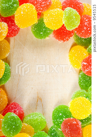 frame a background colorful sweets of sugar candies frame a background colorful sweets of sugar candies 9545515