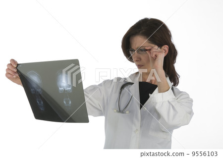 Woman doctor whit radiography a over white background Woman doctor whit radiography a over white background 9556103
