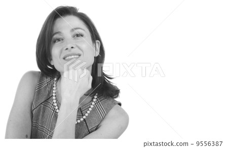 portrait on white background of a forty years old woman in studio 9556387