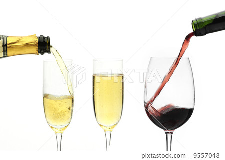 red and white wine being poured red and white wine being poured 9557048
