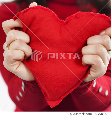 Red heart  in hands 9558189