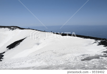 People on volcano mount Etna crater 9559402