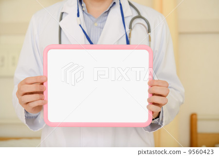 Doctor with whiteboard Doctor with whiteboard 9560423