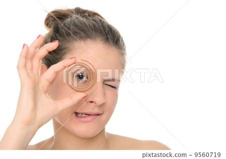 Young woman holds spiral aromas Young woman holds spiral aromas 9560719