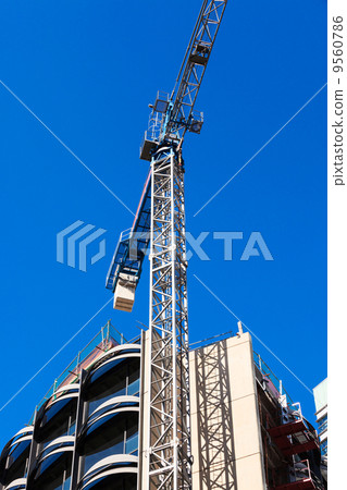 crane at a construction crane at a construction 9560786