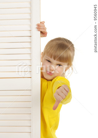 Dissatisfied girl in yellow jacket 9560945