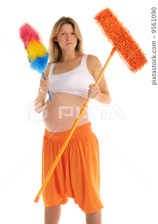 angry pregnant woman with a mop angry pregnant woman with a mop 9561090