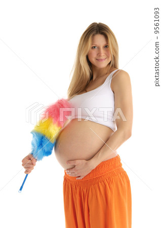 pregnant woman with brush 9561093