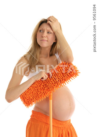 pensive pregnant woman with a mop pensive pregnant woman with a mop 9561094