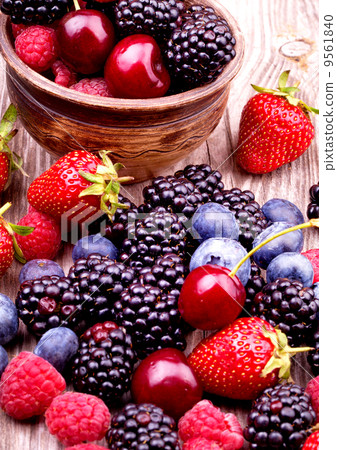 tasty summer fruits on a wooden table tasty summer fruits on a wooden table 9561840