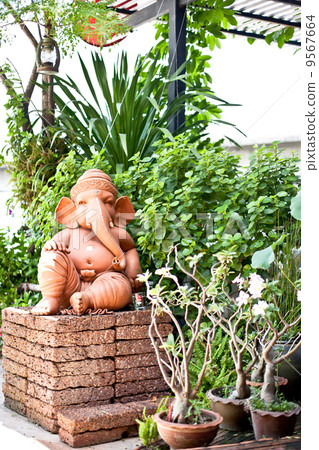 art statue in garden art statue in garden 9567664