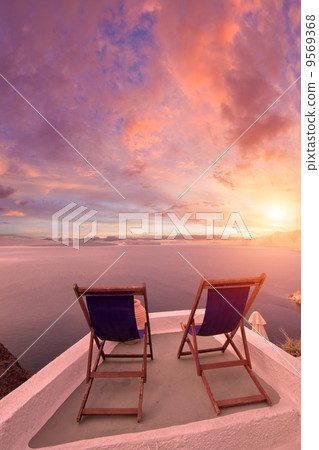 Sunbeds on Santorini 9569368