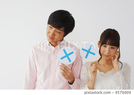 Couple giving a battle card Couple giving a battle card 9570809
