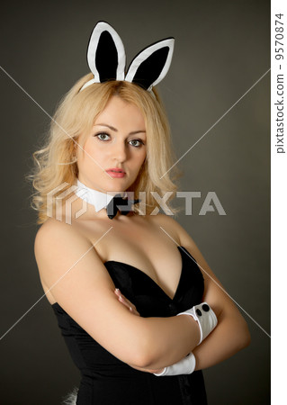 Beautiful young girl in a bunny suit 9570874