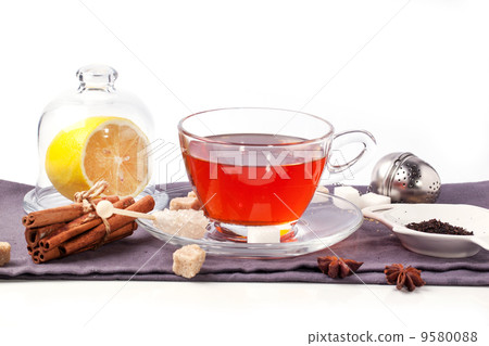 Cup of tea with lemon over white 9580088
