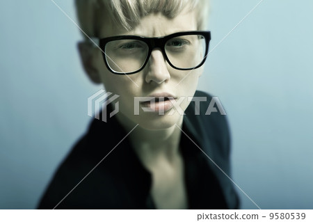 beautiful young blonde girl with glasses beautiful young blonde girl with glasses 9580539