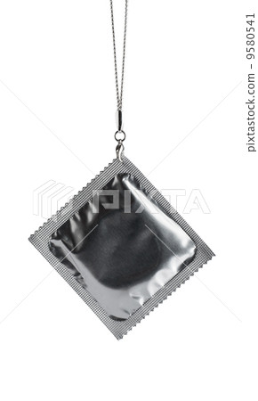Condom with chain isolated on white 9580541