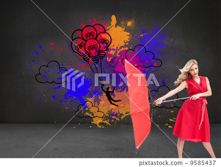 Composite image of elegant blonde holding umbrella 9585437