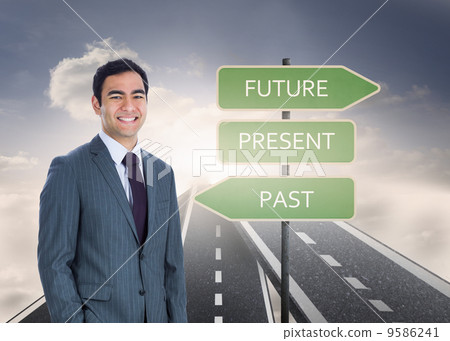 Composite image of smiling businessman standing Composite image of smiling businessman standing 9586241