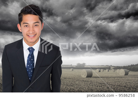 Composite image of smiling asian businessman Composite image of smiling asian businessman 9586258